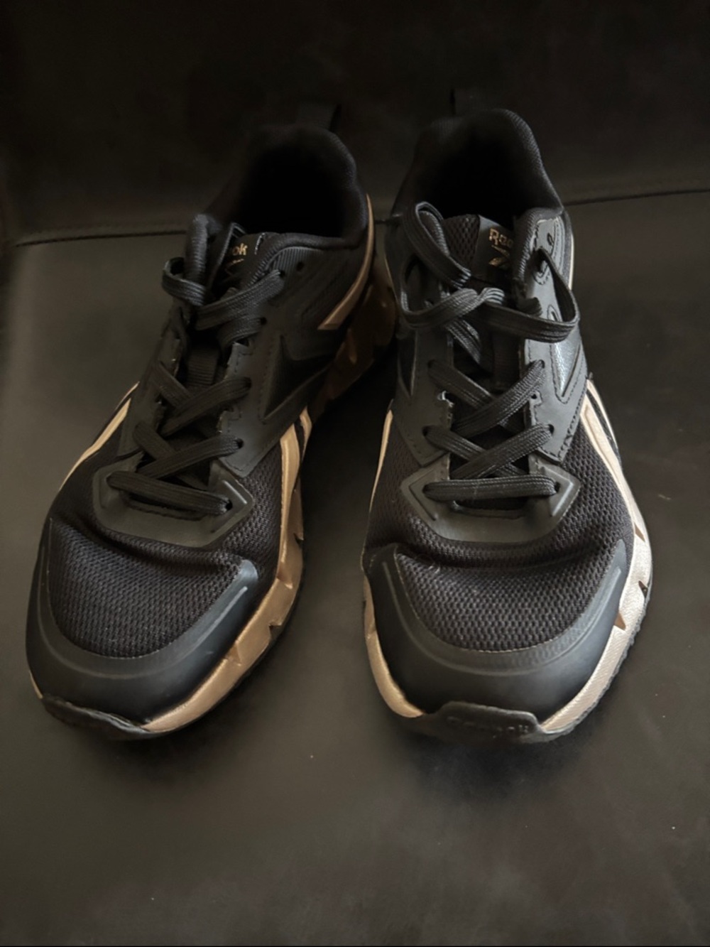 Reebok women’s Black Athletic Galaxy Sneakers with Beige Accents